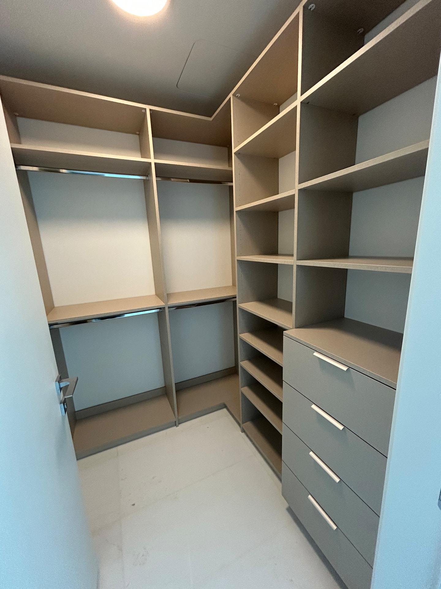 Aston Martin Residences secondary custom closet with shelving and drawers