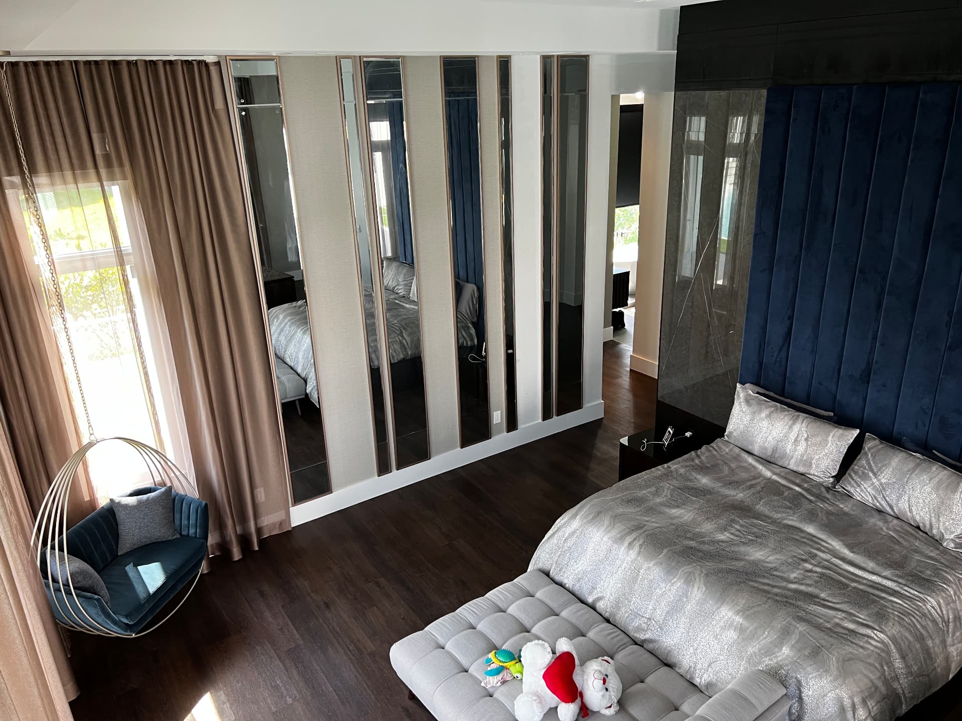 Southwest Ranches primary bedroom with sheer and blackout drapery layers