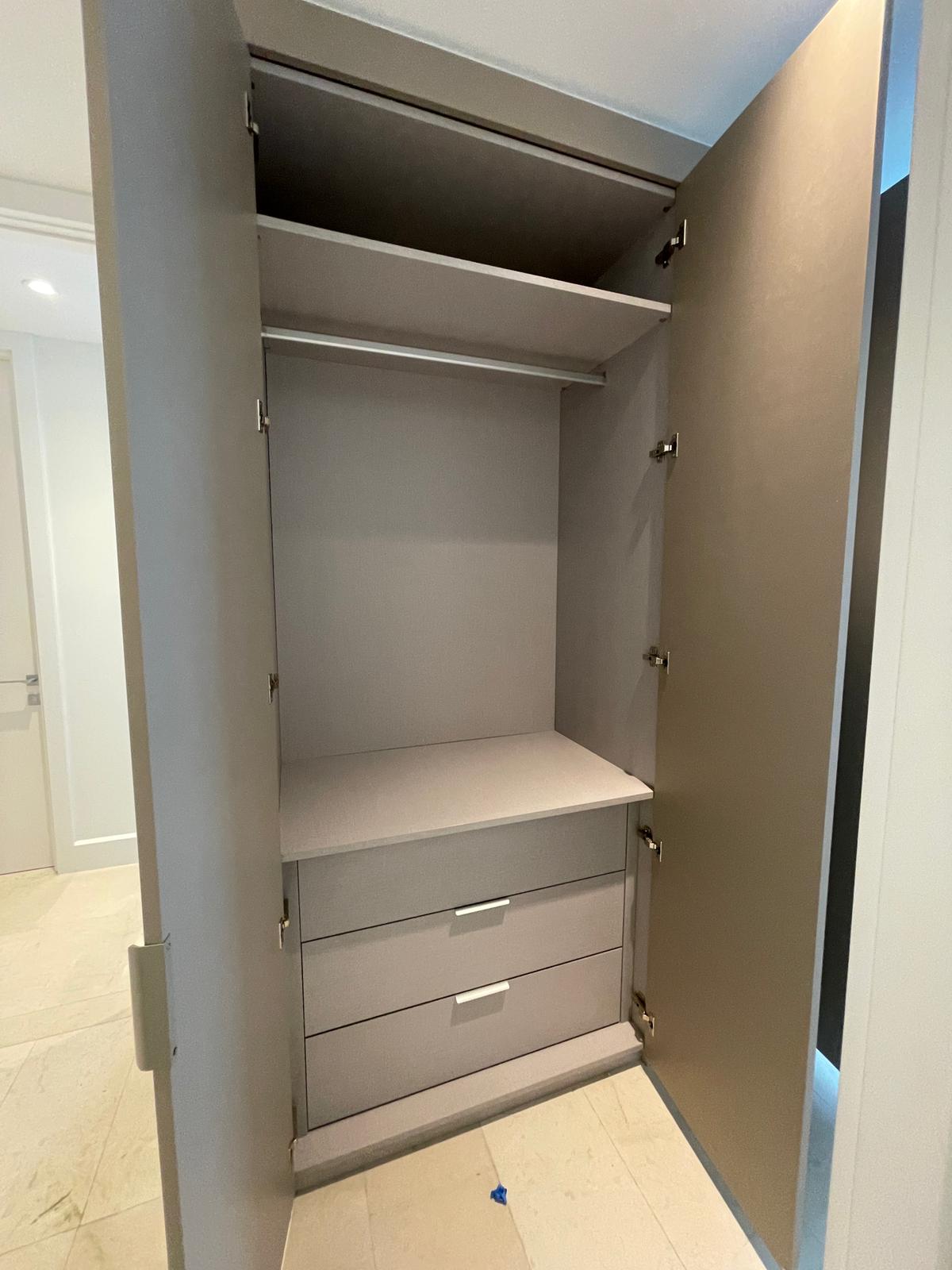 Missoni Baia custom reach-in entry closet with drawers