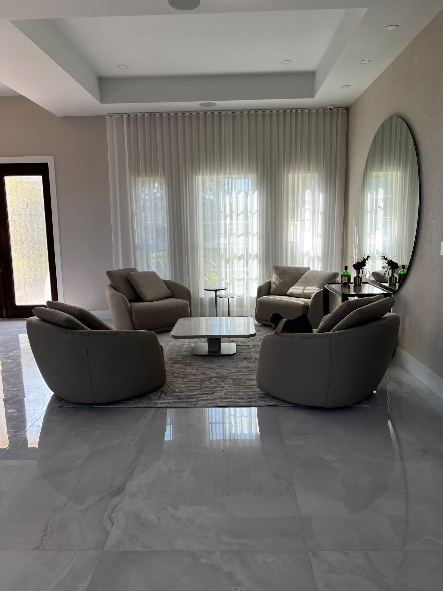 Pembroke Pines living room with wall-to-wall sheer drapery