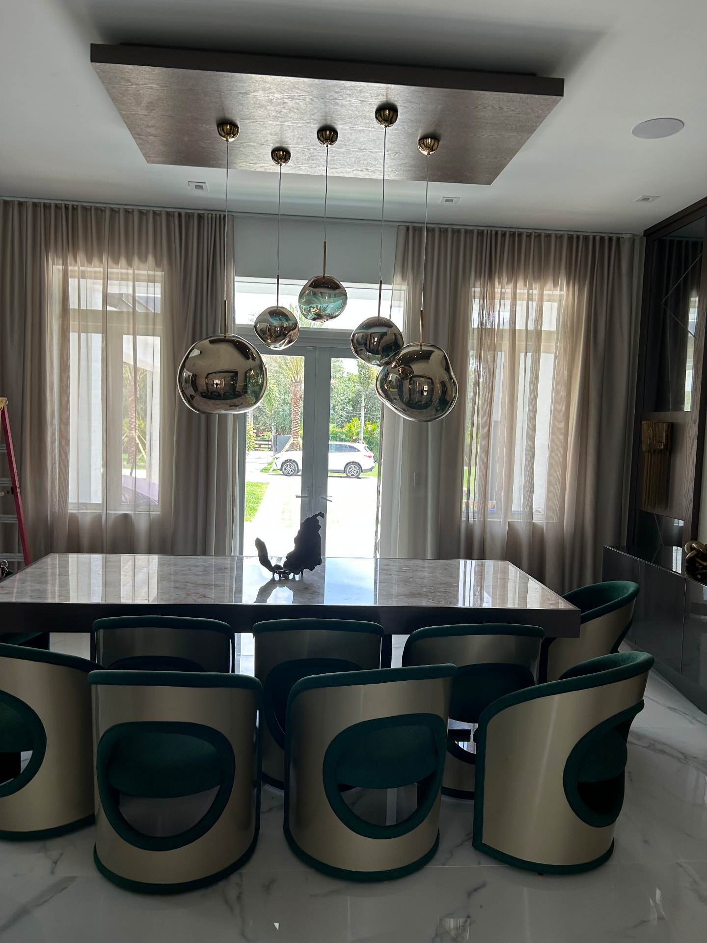 Southwest Ranches dining room with sheer curtains and drapery panels