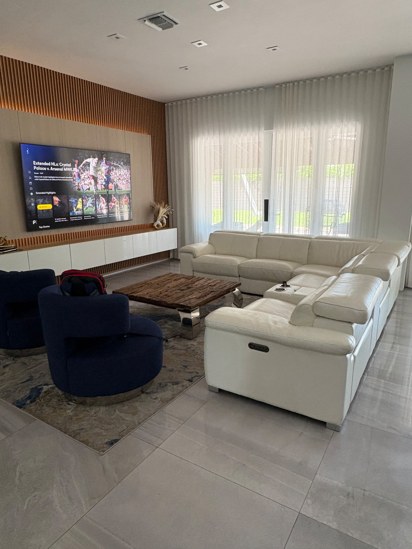 Doral Isles family room with wall-to-wall sheer drapery