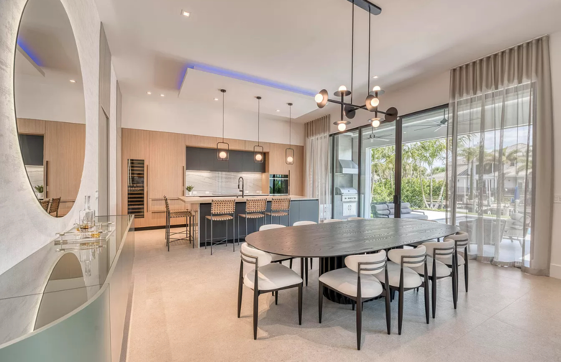 West Palm Beach estate dining room with coordinated sheer drapery