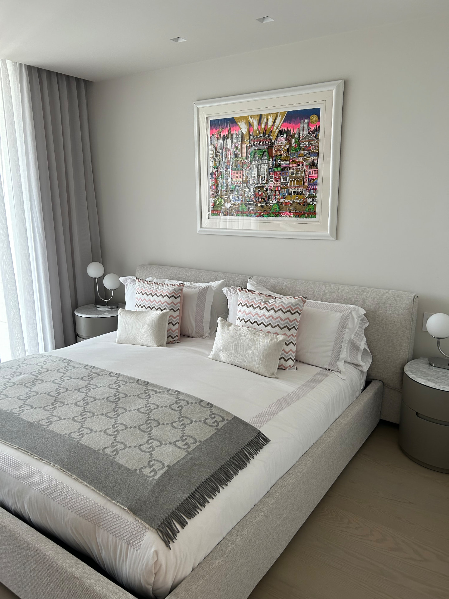 Missoni Baia guest bedroom with layered sheer and blackout drapery