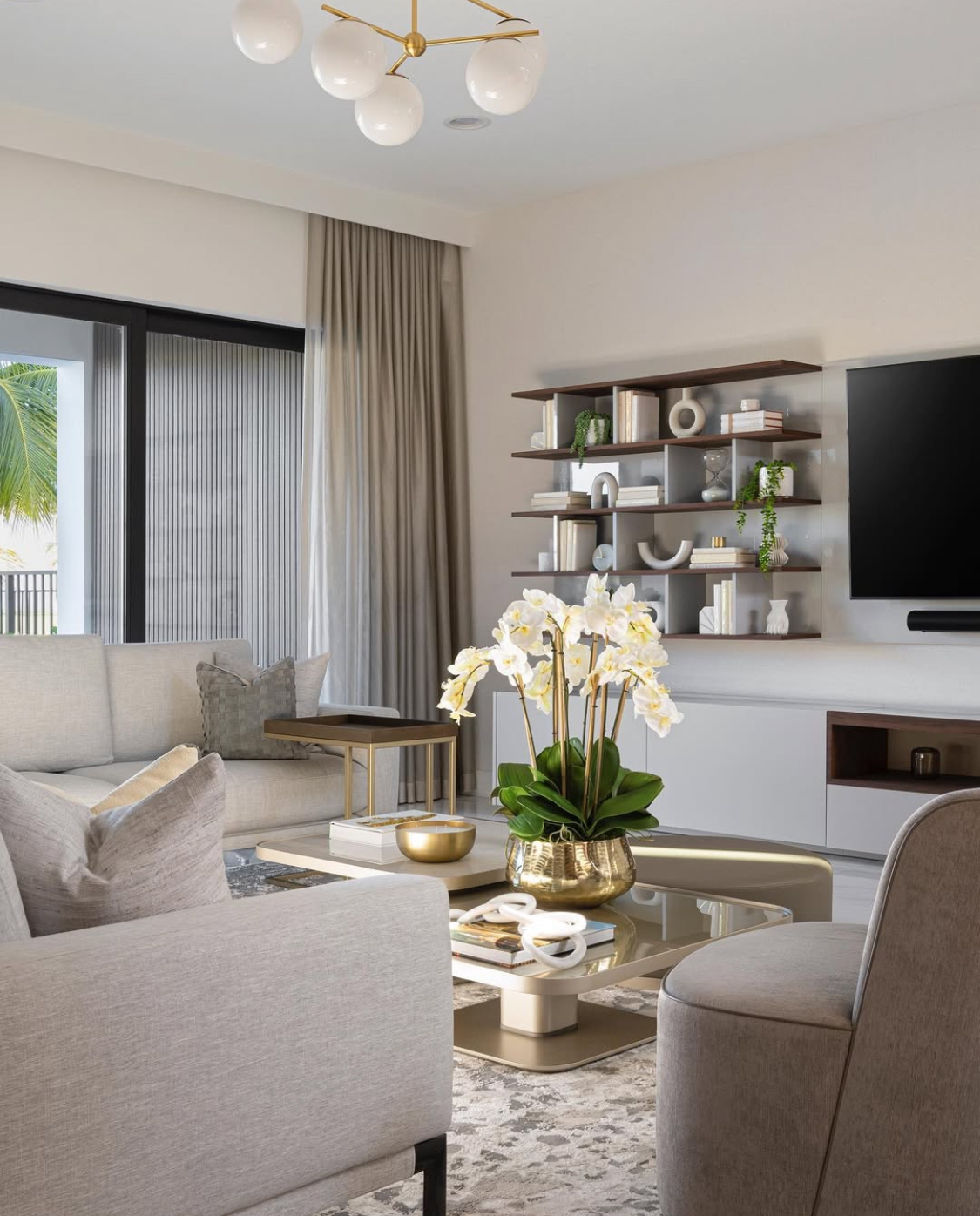 Doral Isles television lounge with neutral full-height drapery