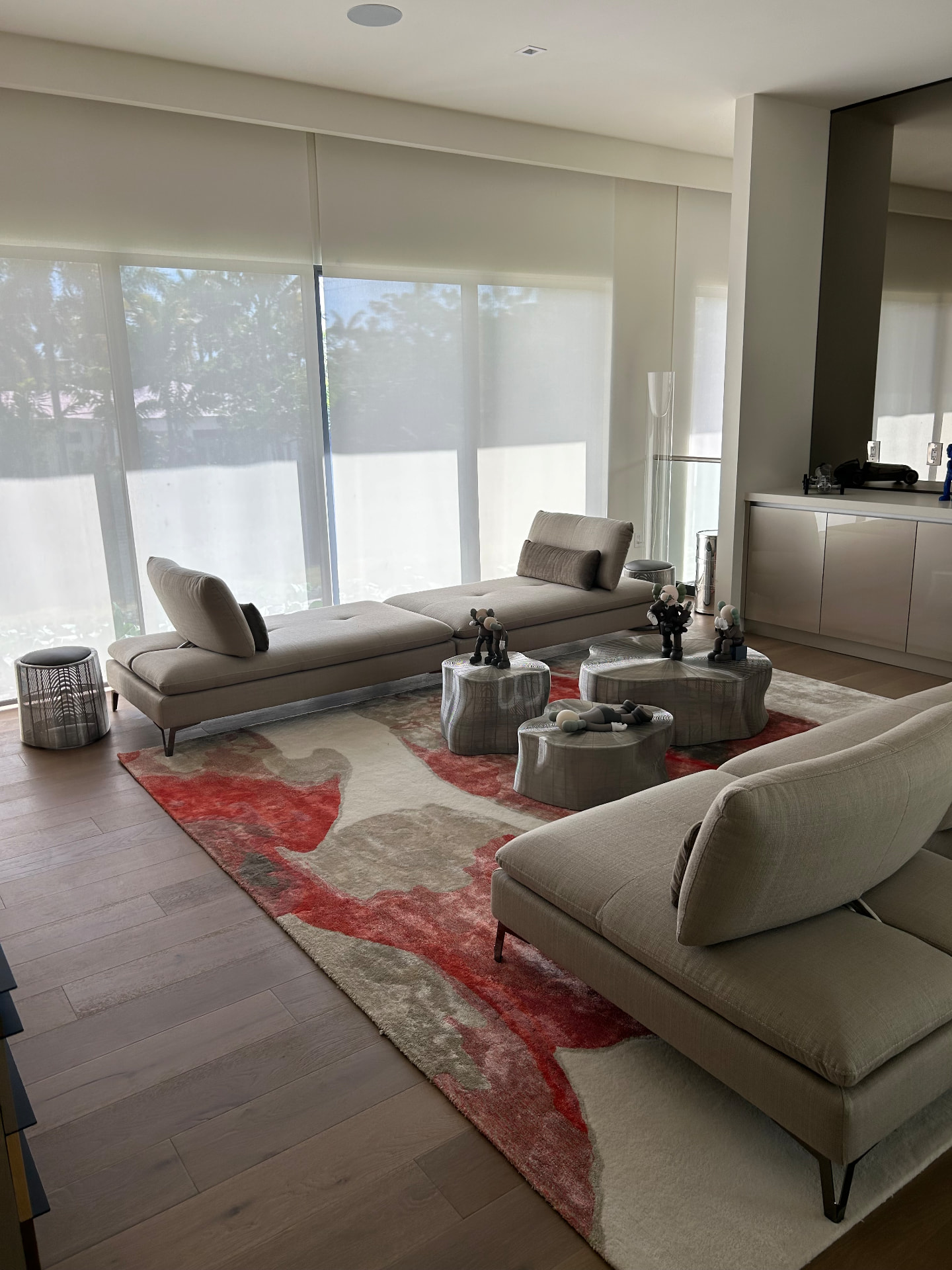 Pinecrest mansion family lounge with motorized solar shades