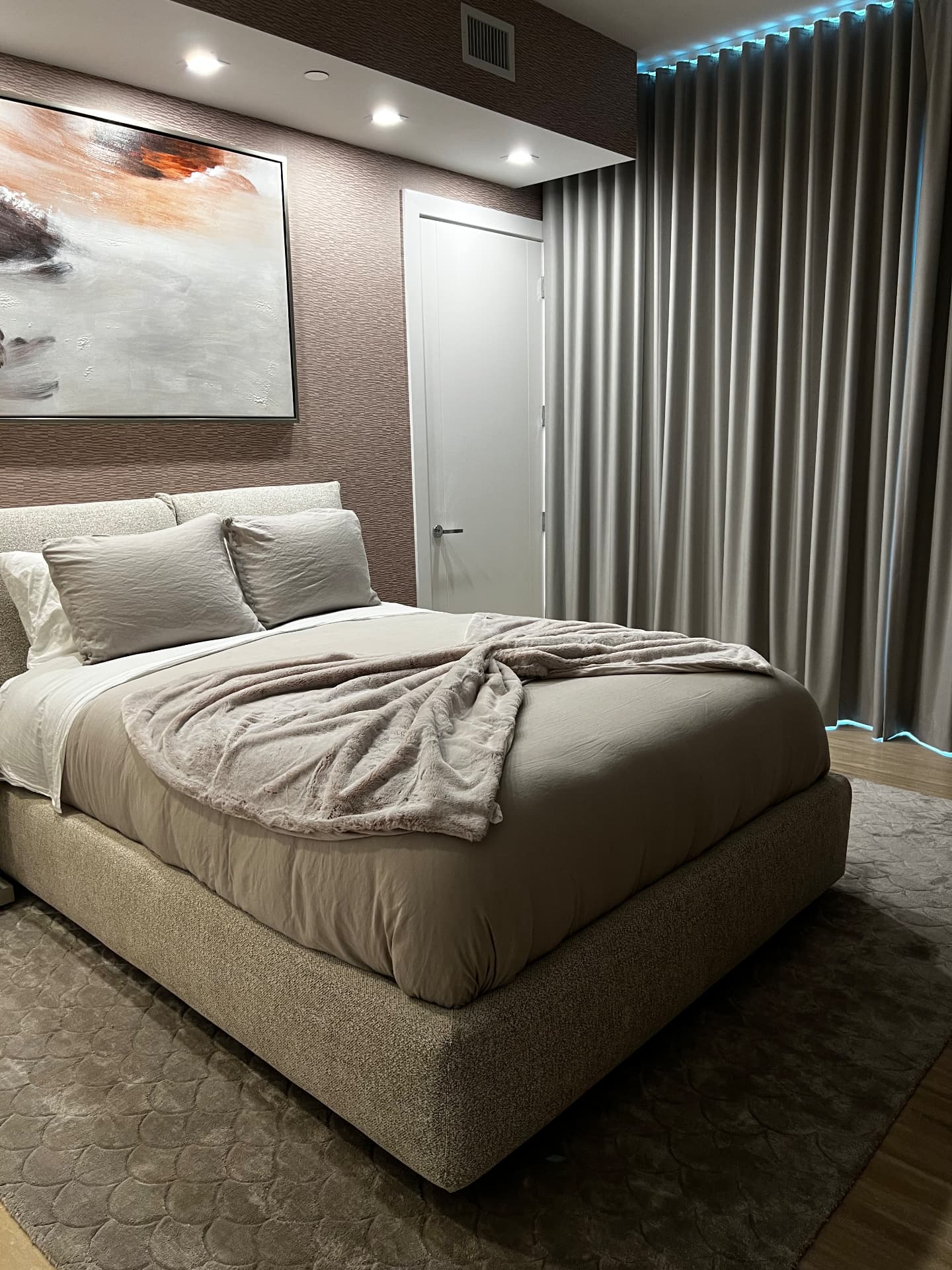 Turnberry guest bedroom with room-darkening drapery and textured wallcovering