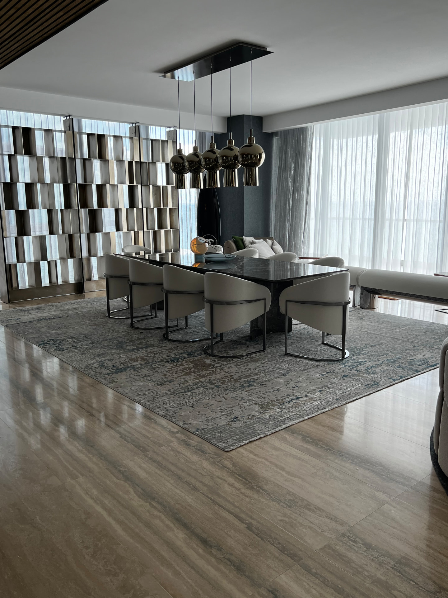 Turnberry dining room with sheer drapery and a dim-out panel